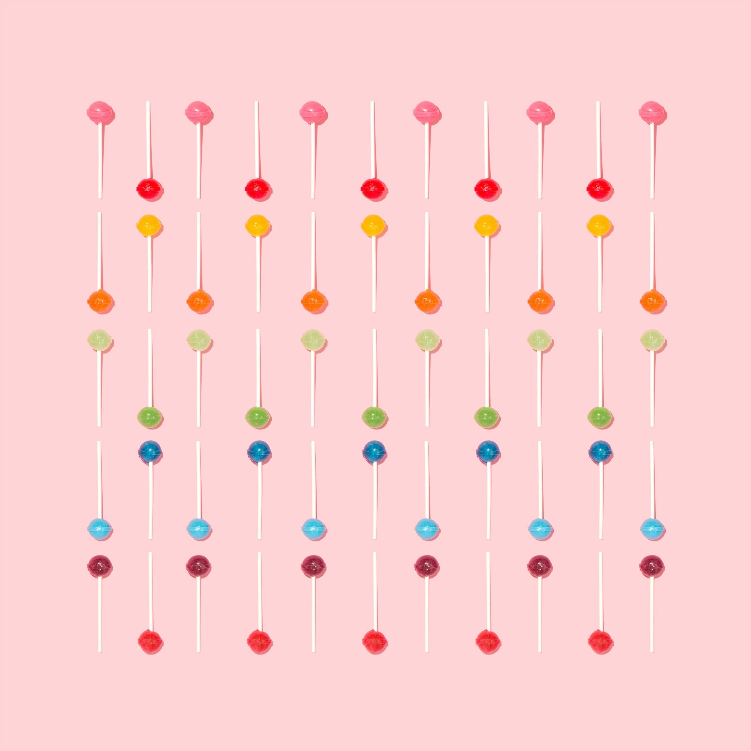 How to use segmentation in email marketing - image of multicoloured lollipops on a pink background
