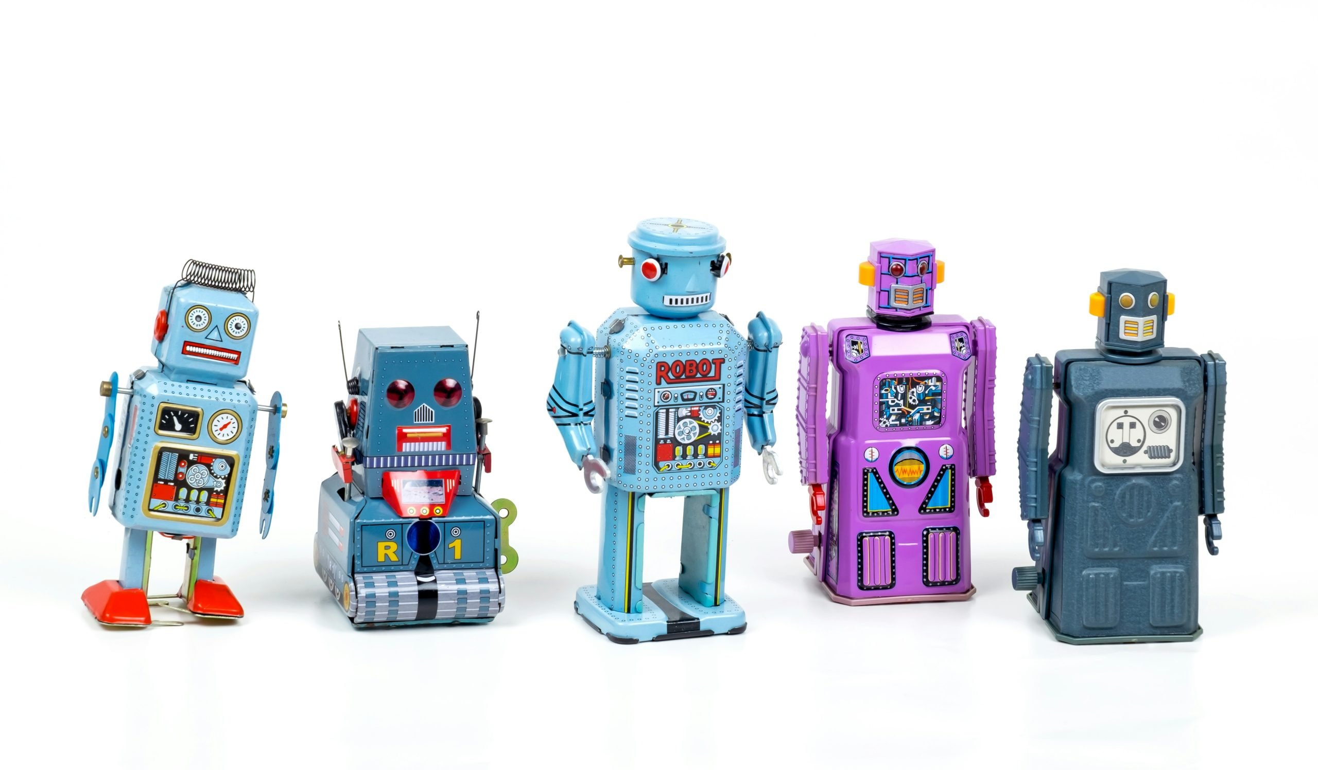 The power of AI in digital marketing: strategies for small businesses - image of a line of colourful toy tin robots